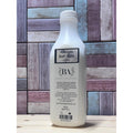 Bottle of 'Alleviate Bath Salts' with a wooden background