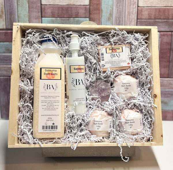 Satsuma Kit includes. 1 - 900g Satsuma Bath Salts, 1 - 250ml Satsuma Lotion, 1 - 150 g Satsuma Bar Soap, 3 -Satsuma Bath Bombs, 1 - Amethyst stone,  all in a hand made Wood Crate. Retail Value over $58.50. 