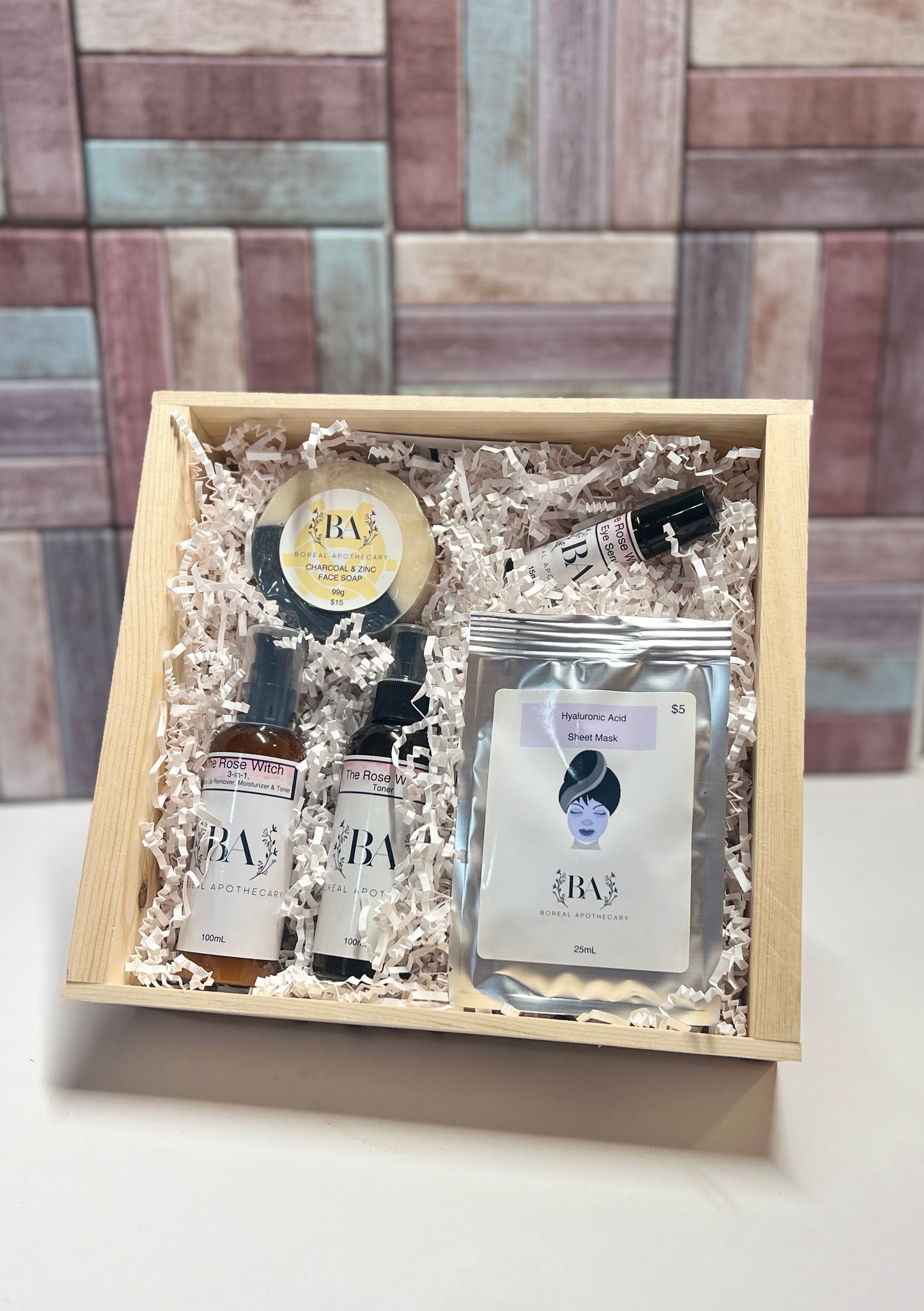 The Rose Witch Facial Kit includes: 1 - Charcoal & Zinc Soap, 1 - Reformulated Rose Witch 3 in 1 (now with Hyaluronic Acid), 1 - Rose Witch Toner, 1 - Rose Witch eye Serum and 1 - Hyaluronic Sheet Mask, all in a hand made Wood Crate.  Retail Value over $75. 