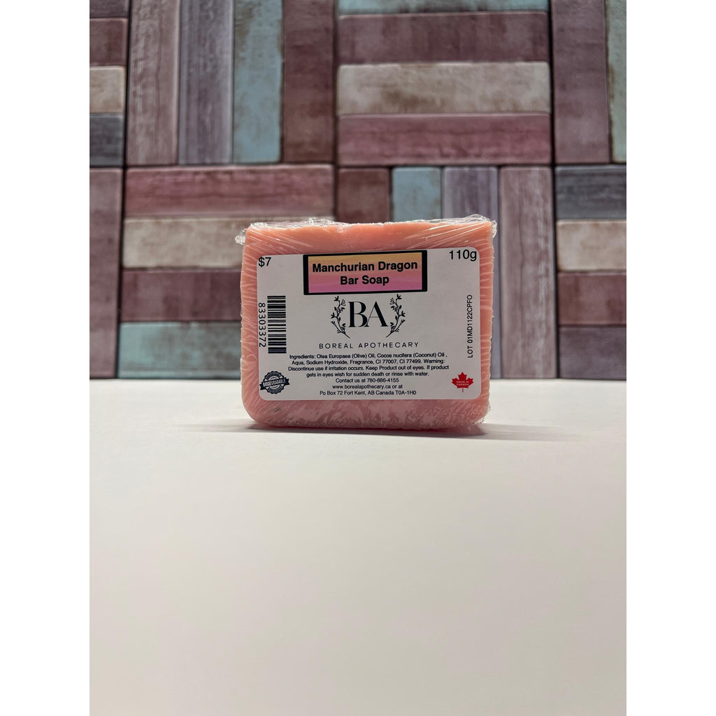 Manchurian Dragon bar soap  on a white surface and wooden background