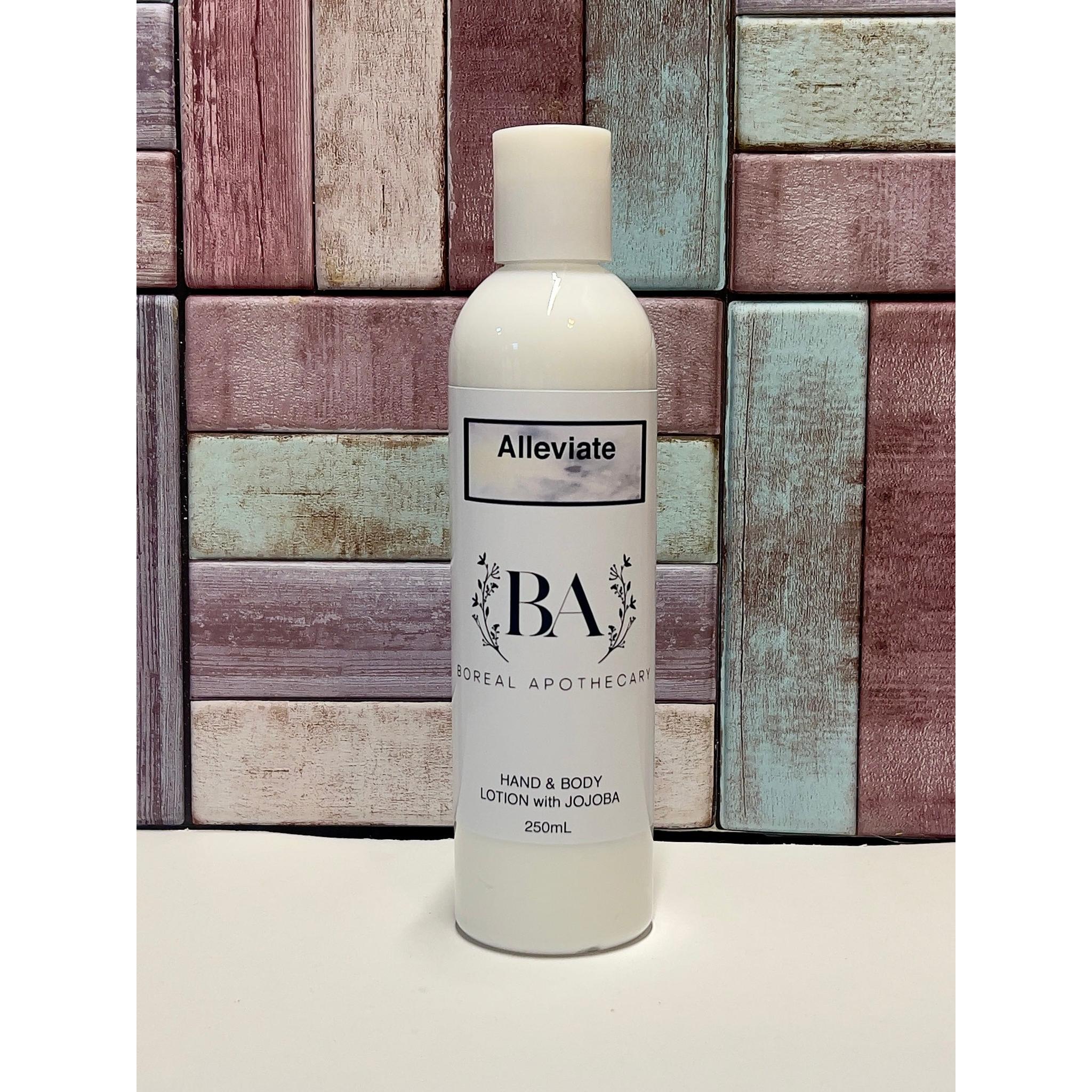 White bottle of 'Alleviate' hand and body lotion with a wooden background