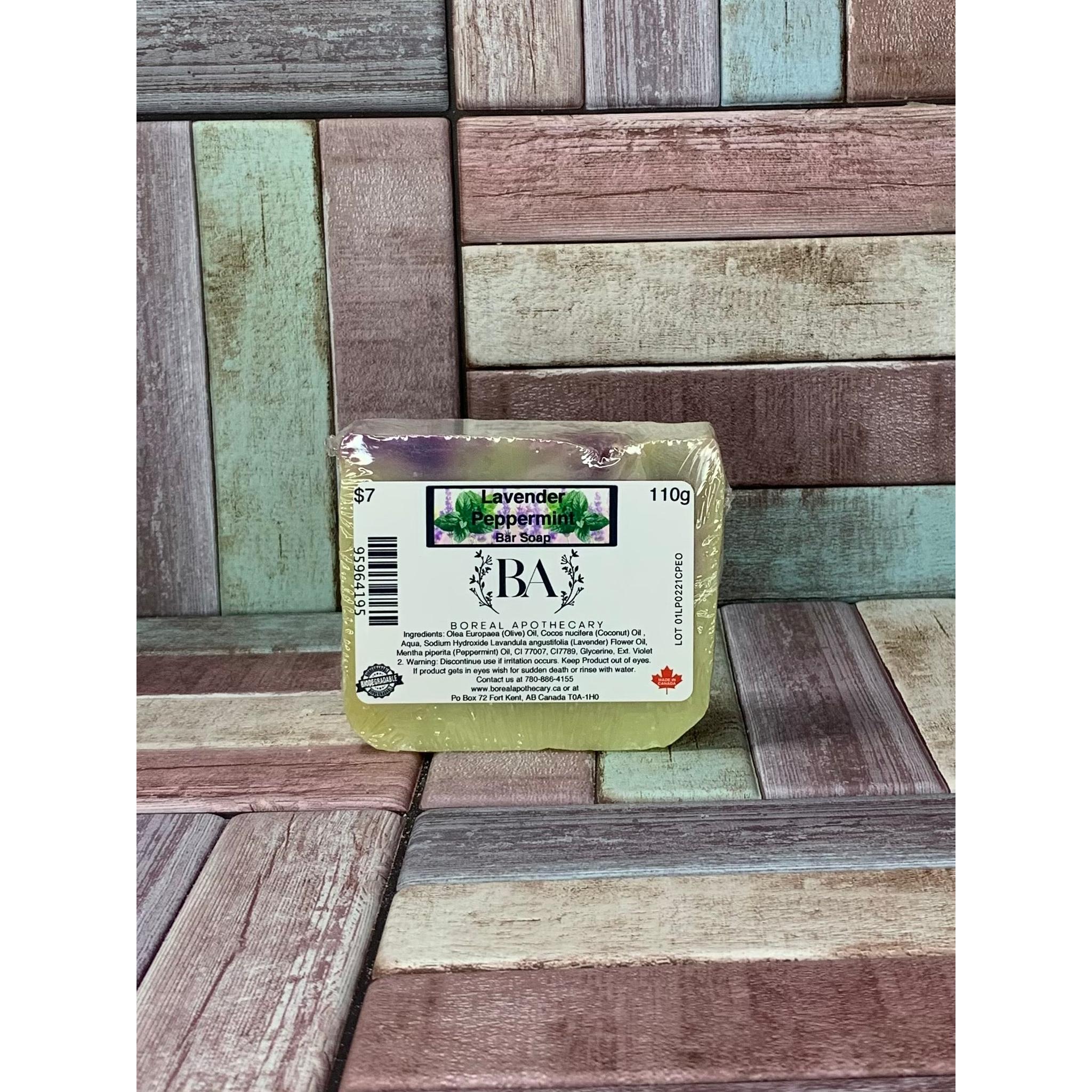 Bar of soap with a label on a wooden background